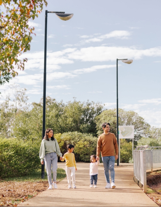 Greater Adelaide Regional Plan - Family of four on a walk in a park.